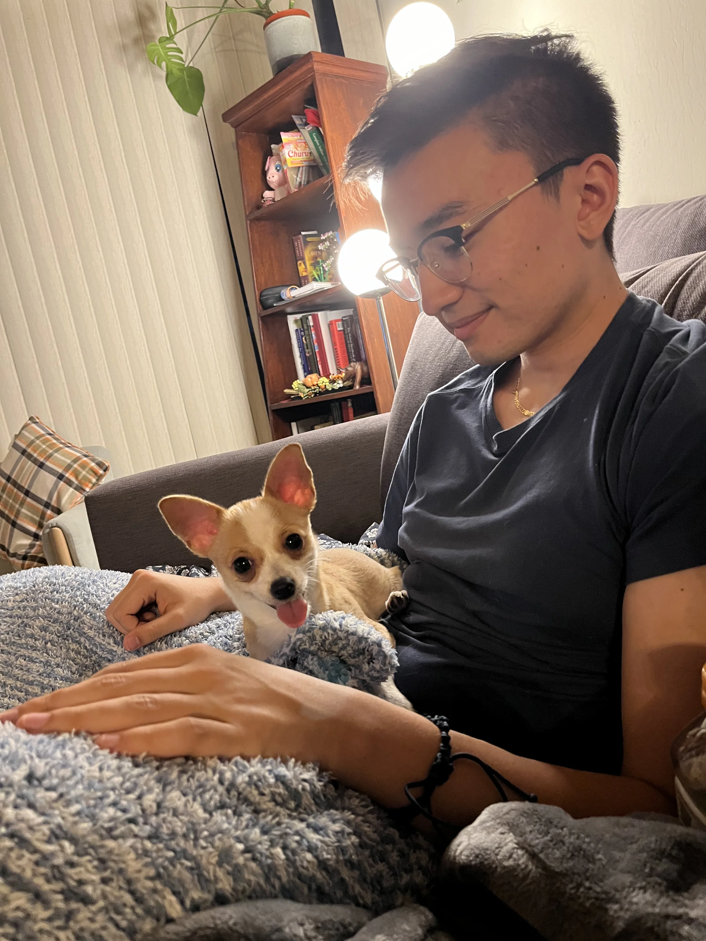 Geoff on the couch with Biscuit the chihuahua